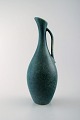 Gunnar Nylund, Rörstrand vase/pitcher with handle in ceramics. 
