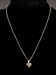 14ct carat 
necklace L. 
38.5 cm. and 
heart pendant 
1.6 x 1 cm. No. 
338457