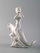 Harald Salomon for Rörstrand, blanc de chine / white glazed figure of a fawn 
riding on fabel creature.
