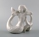 Harald Salomon 
for Rörstrand, 
white glazed 
figure of a 
faun / pan.
Hallmarked. 
In perfect ...