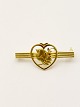 Georg Jensen 
brooch bird 
with olive 
branch L. 3 cm. 
18 karat 765 
gold pattern 
341 stamp 
before ...