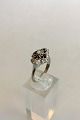 Ring in 18K 
White Gold with 
Brilliant and 
Dark Blue 
Enamel. Ring 
size 55 / US 7. 
Weighs 4.06 g / 
...