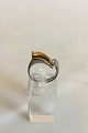 Ring in 14K 
Gold and White 
Gold with 
Brilliant. Ring 
size 51 / US 6. 
Weighs 6.07 g / 
0.21 oz. ...