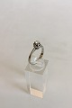 Ring in White 
Gold with 
Brilliant in 
0.2 carat. 18 
K. Ring size 56 
/ US 8. Weighs 
2.84 g / 0.10 
...