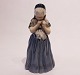 Royal porcelain 
figure, 
Bornholm girl, 
no. 1323.
Dimensions: 
H:21cm W:10cm 
D:8cm.
