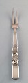 Georg Jensen. Cutlery, Scroll No. 22, hammered sterling silver roast fork.