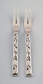 Evald Nielsen No. 30 (leaf pattern), 2 pcs. herring/Cold cut forks in sterling 
silver.