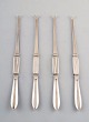 Four Georg Jensen Silver Bernadotte lobster forks.
