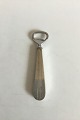 Axel Holm, 
Copenhagen 
Sterlin Silver 
and Stainless 
Steel Bottle 
Opener. 
Measures 15 cm 
/ 5 29/32 ...