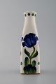 Aluminia 
faience vase, 
hand-painted 
with floral 
motifs.
Measures 15 
cm. x 5 cm.
Number ...