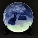 Diameter 18 cm.
Motive: Two 
hares in the 
snow.
