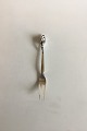 Georg Jensen 
Sterlin Silver 
Meat Form with 
3 Tines Blossom 
No 84. Measures 
20.7 cm / 8 
5/32 in.
