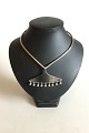 Hans Hansen 
Sterlin Silver 
Necklace with 9 
balls. MEasures 
13.7 cm / 5 
25/64 in dia. 
Pendant 8.7 ...