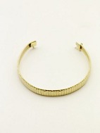18 karat gold arm bracelet