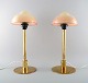 Fog & Mørup : A pair of fried eggs tablelamps. Brass frames with glass shades.
