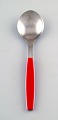 Dessert spoon. Henning Koppel. Strata cutlery stainless steel and red plastic.
