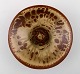 Axel Salto: b. Copenhagen 1889, d. Frederiksberg 1961.
Royal Copenhagen circular bowl of stoneware in fluted style.