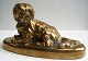 Bronze figure 
of lying dog on 
oval foot, 19th 
century. L .:16 
cm. D: 6.5 cm. 
H: 8.5 cm. ...