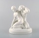 Gerhard Henning 1880-1967, for Royal Copenhagen. Amor og Psyche, figur af 
porcelæn, blanc de chine.