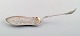 Serving spade 
in danish 
silver (830). 
1917
Measures 28 
cm.
Stamped.
In very good 
condition. ...