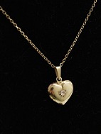 H Siersbl 8 karat gold necklace and heart pendant