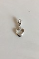 Georg Jensen 
Sterling Silver 
Charm "Hearts 
of Georg 
Jensen". 
Measures 3 cm / 
1 3/16 in. 
Weighs 2 ...