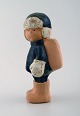 Lisa Larson for Gustavsberg. Rare stoneware figure of boy with school bag.
