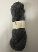 Mohair Bouclé
Mohair Bouclé is a natural product of a very high 
quality from the angora goat from South Africa.
The colour shown is: Steel grey, Colourno 1035
1 ball of wool containing 100 grams