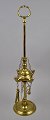Oil Roman lamp 
in brass, 19th 
century. Round 
foot. With oil 
container with 
four tips. The 
lamp ...