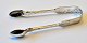 English sugar 
tongs, 19th 
century. 
Stamped. With 
decorations. 
Length: 11 cm.
Great 
condition!