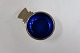 Georg Jensen. 
Pyramid, salt 
cellars with 
blue enamel. 
Sterling (925). 
Design, Harald 
Nielsen.
