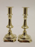 A pair of brass candlesticks