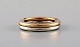 Modernist Georg Jensen ring in 18 carat red gold and sterling silver.
