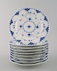 A set of 9 pieces. Antique blue fluted full lace flat plates from Royal 
Copenhagen.
