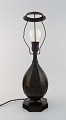 Just Andersen (1884-1943). Table lamp in patinated "disko" metal.
