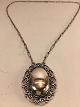Skønvirke
Silver pendant 
with 
silverstone.
stamped: 830 s 
LJ. 33
pendant: 
height: 4.8 cm. 
...