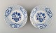 A pair of Meissen blue onion pierced/reticulated plates.
