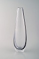 Vicke 
Lindstrand for 
Kosta Boda art 
glass vase.
Signed: Kosta.
Measures: 28,5 
cm. X 8,5 ...