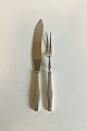 Hans Hansen 
Sterling Silver 
and Stainless 
Steel Charlotte 
Carving Set. 
Measures: Knife 
30.5 cm / ...