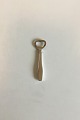 Hans Hansen 
Sterling Silver 
Charlotte 
Bottle Opener. 
Measures 12.5 
cm / 4 59/64 
in.