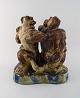 Knud Kyhn 1880-1969 for Royal Copehagen. Very large and rare figure of stoneware 
in the form of two male monkeys