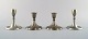 Just Andersen art deco 2 pairs of pewter candlesticks.
