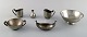 Just Andersen art deco collection of bowls, vases and creamers in pewter. 1940 
s.