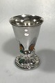 Georg Jensen 
Silver Vase No 
123 Amber 
Decorations H. 
16 cm; diam. 
10.4 cm; 
weight: 296 g. 
French ...