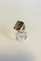 Bent Knudsen 14 
K Gold Ring 
with smoke 
Quartz. Ring 
Size 53 / 7. 
Weighs 15.7 g / 
0.55 oz.