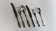 Evald Nielsen. 
Silver (830). 
No. 25.  12 
people cutlery. 
Total 138 
parts. 
Consisting of :
12 ...