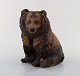 Rare Jeanne Grut for Royal Copenhagen Aluminia Faience. Sitting bear. Model 
Number 3823.
