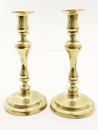 A pair of brass candlesticks