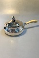 Evald 
NielsenLidded  
Casserole of 
Silver with 
handle of 
Ivory. Measures 
29 cm / 11 
27/64 in. ...