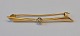 Tie pin in 14 
carat gold with 
brillant 0,10 
carat. Denmark. 
Weight: 1.4 
grams. Stamped: 
585. ...